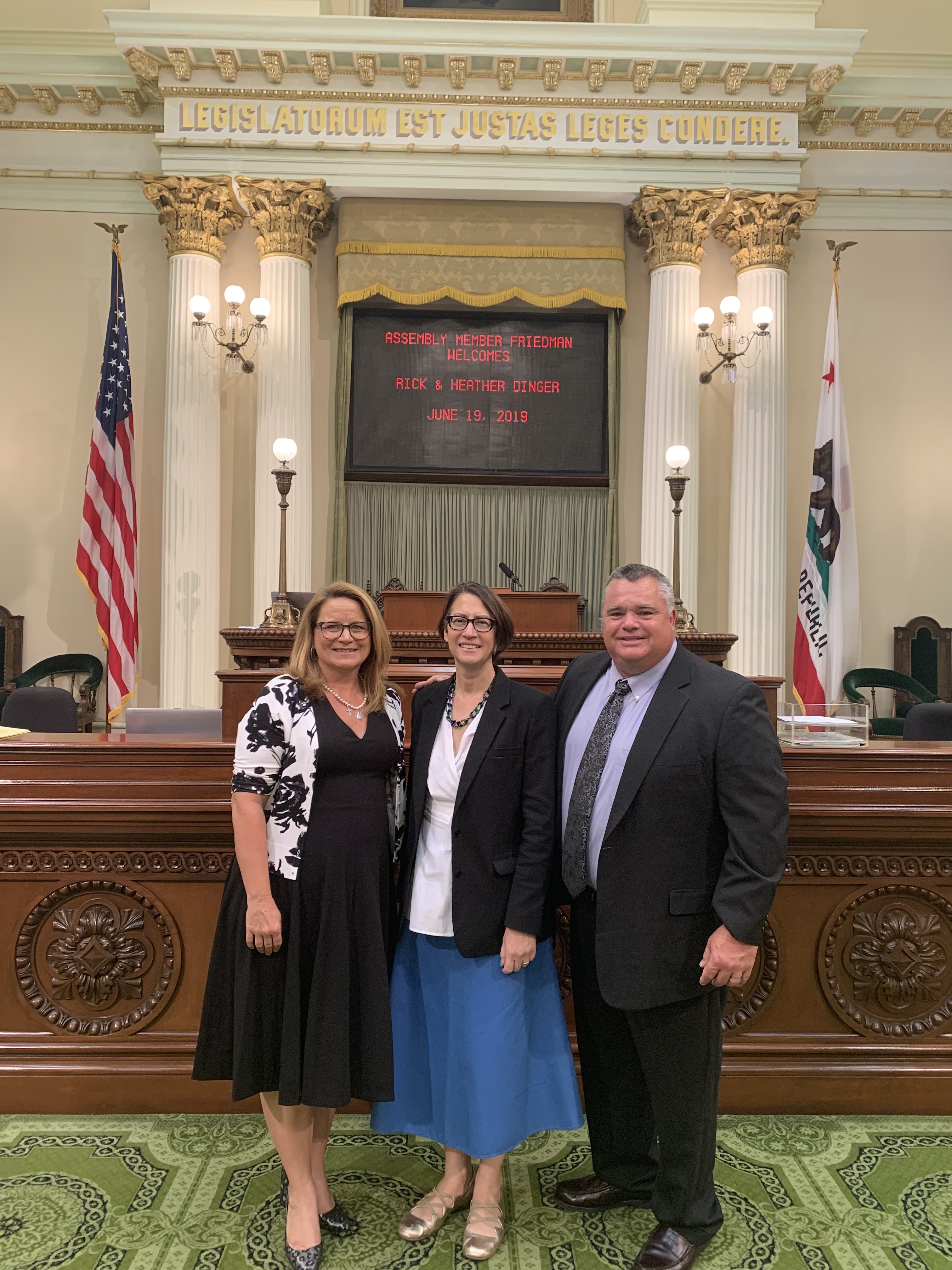 Friedman presents Crescenta Valley Insurance President Rick Dinger, and his wife Heather Dinger, on the Assembly Floor.