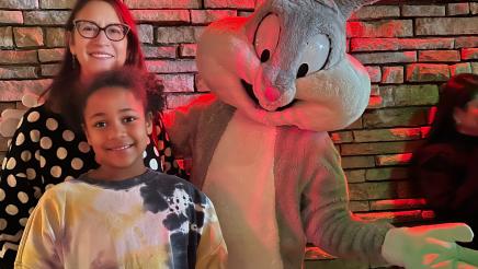 Assemblymember Friedman and daughter pose with Bugs Bunny.