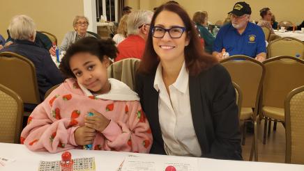 Assemblymember Friedman and her daughter play a round of BINGO.