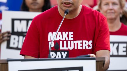 Organizers speak at Make Polluters Pay rally