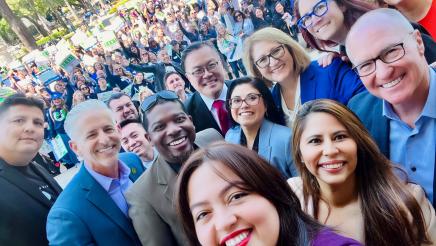 Assemblymember Friedman and other legislators at UNAC rally