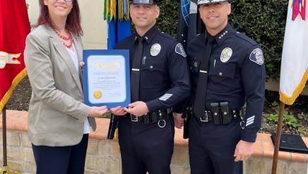 Assemblymember Laura Friedman presents Lt Alex Krikorian with a certificate along with Glendale Police Chief, Chief Cid