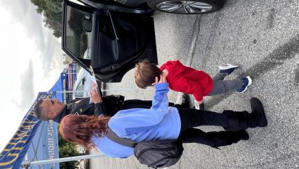 Officer helps parent install car seat