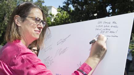 Laura Friedman signs denim day pledge